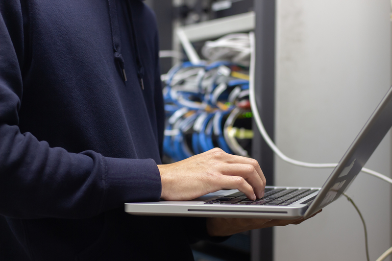 Technician working on laptop